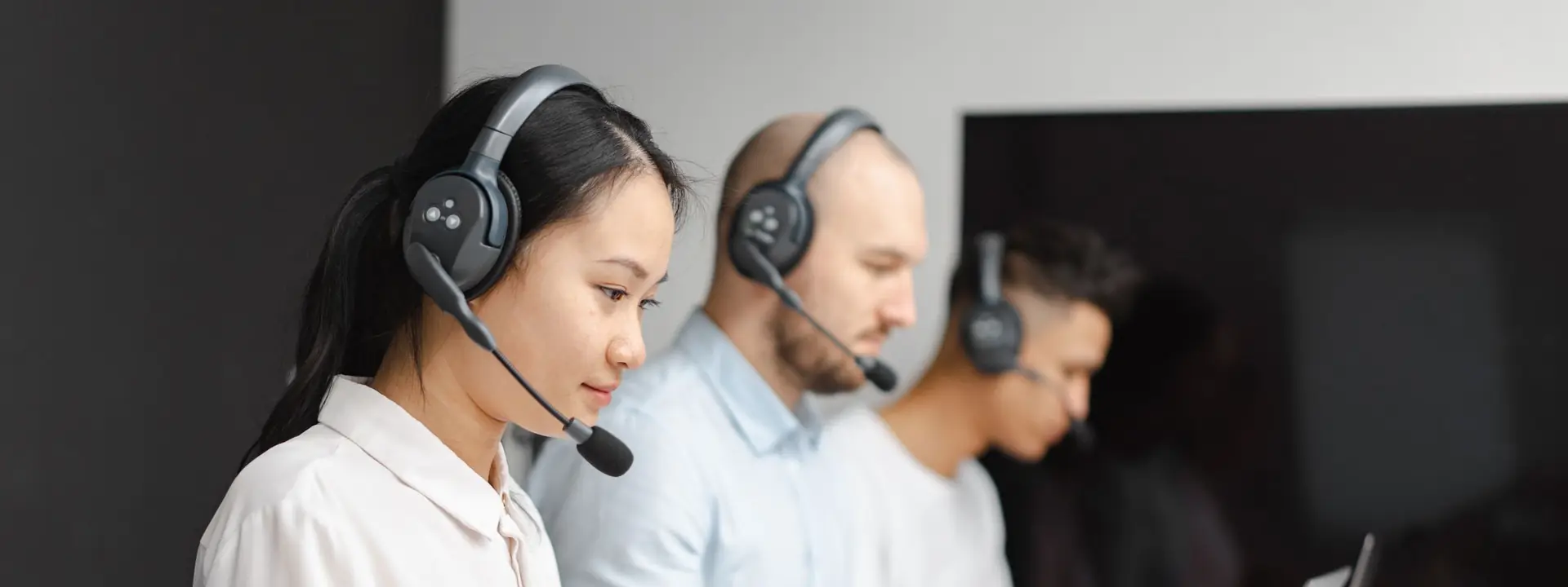 Outsourced call center agents working across the CrossShore delivery centre floor in India